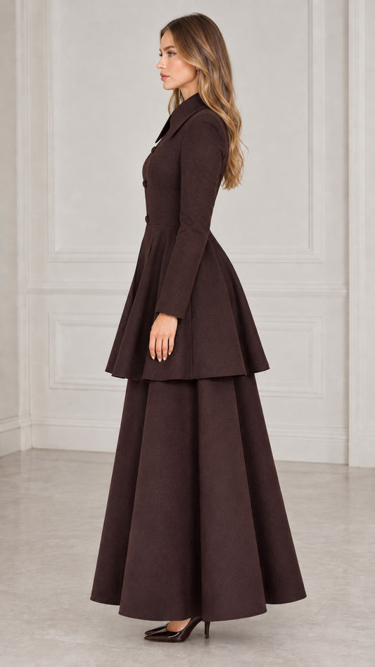 Side profile view of woman modeling brown long sleeve tiered coat dress