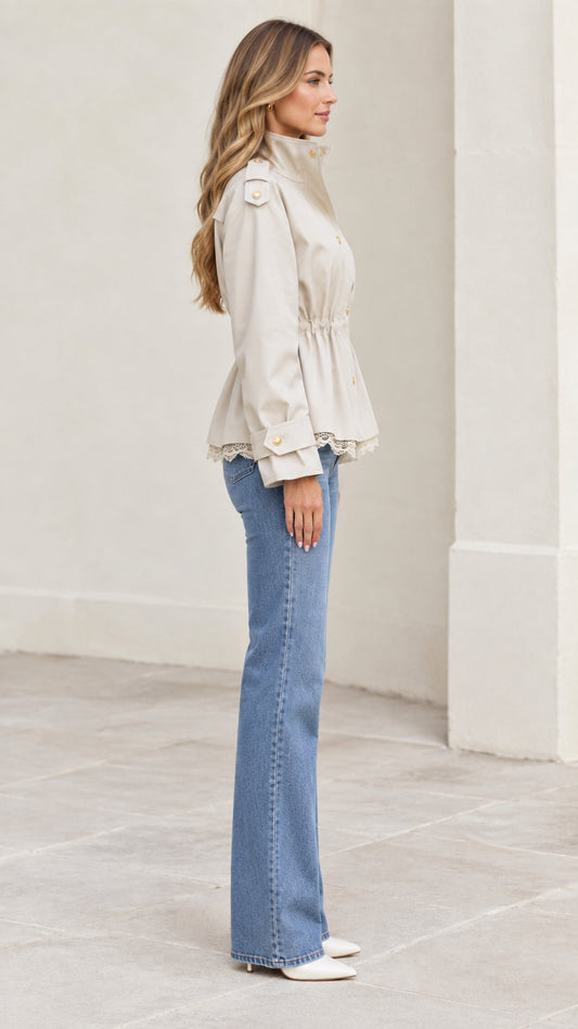 Side profile view of beige lace trim utility jacket showing waist cinch and sleeve detail