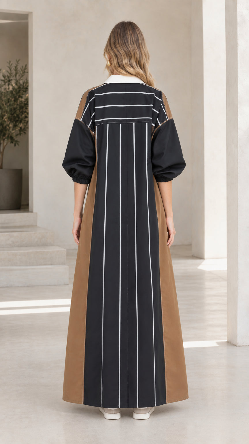Back view of Black colorblock maxi dress showcasing linear stripe pattern