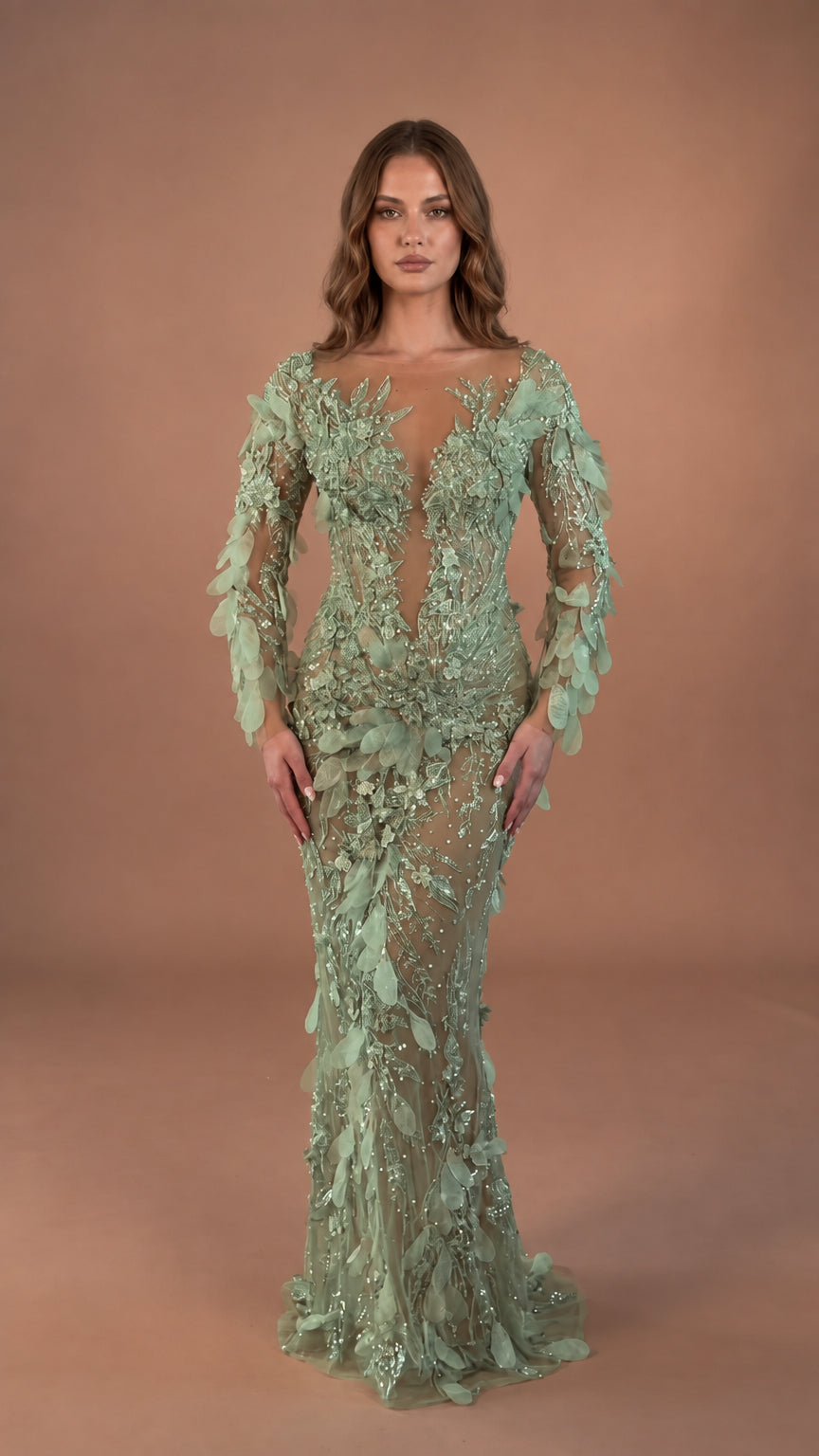 Front view of model in Sage Green beaded long sleeve mermaid gown