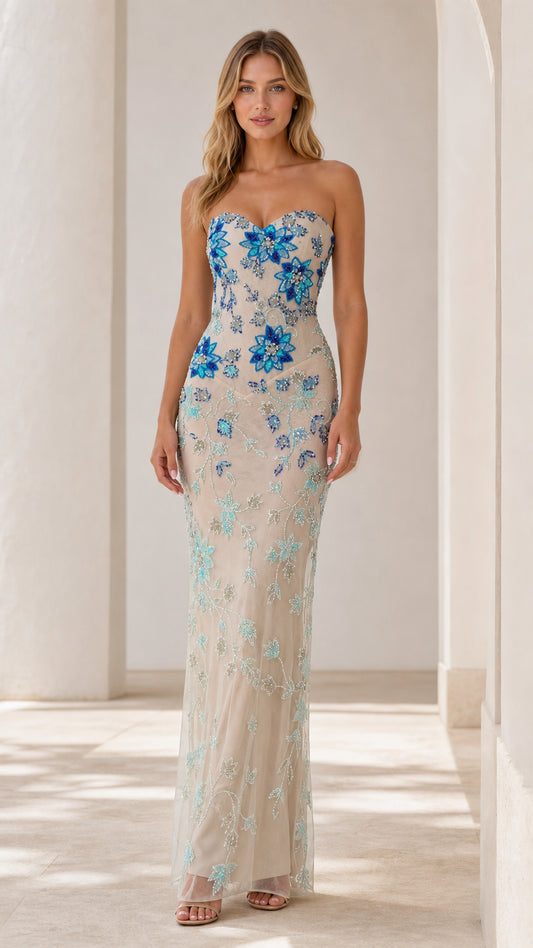 Front view of champagne strapless floral beaded evening gown