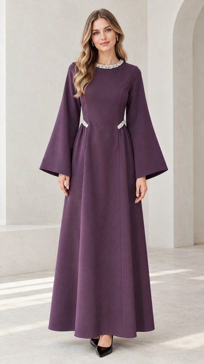 Front view of model wearing purple embellished flare sleeve maxi dress
