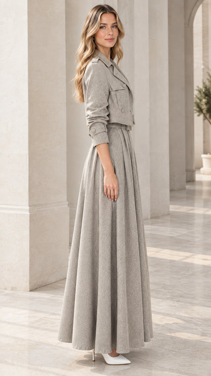 Side profile of model wearing Heather Grey two-piece tailored jacket and maxi dress