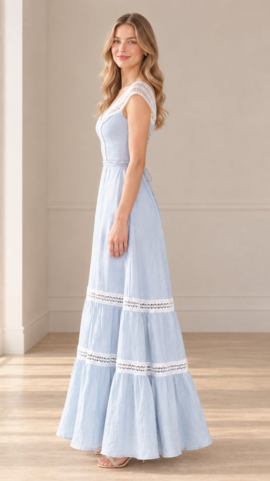 Side profile of model in light blue corset back maxi dress