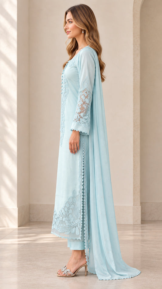 Side profile view of sky blue embroidered tunic and trousers set