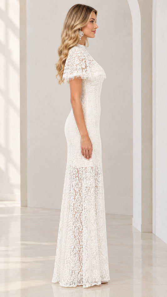 Side profile of woman wearing ivory floral lace floor length formal dress