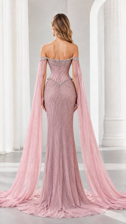 Back view of dusty rose beaded evening dress showing off-shoulder cut and cape sleeves