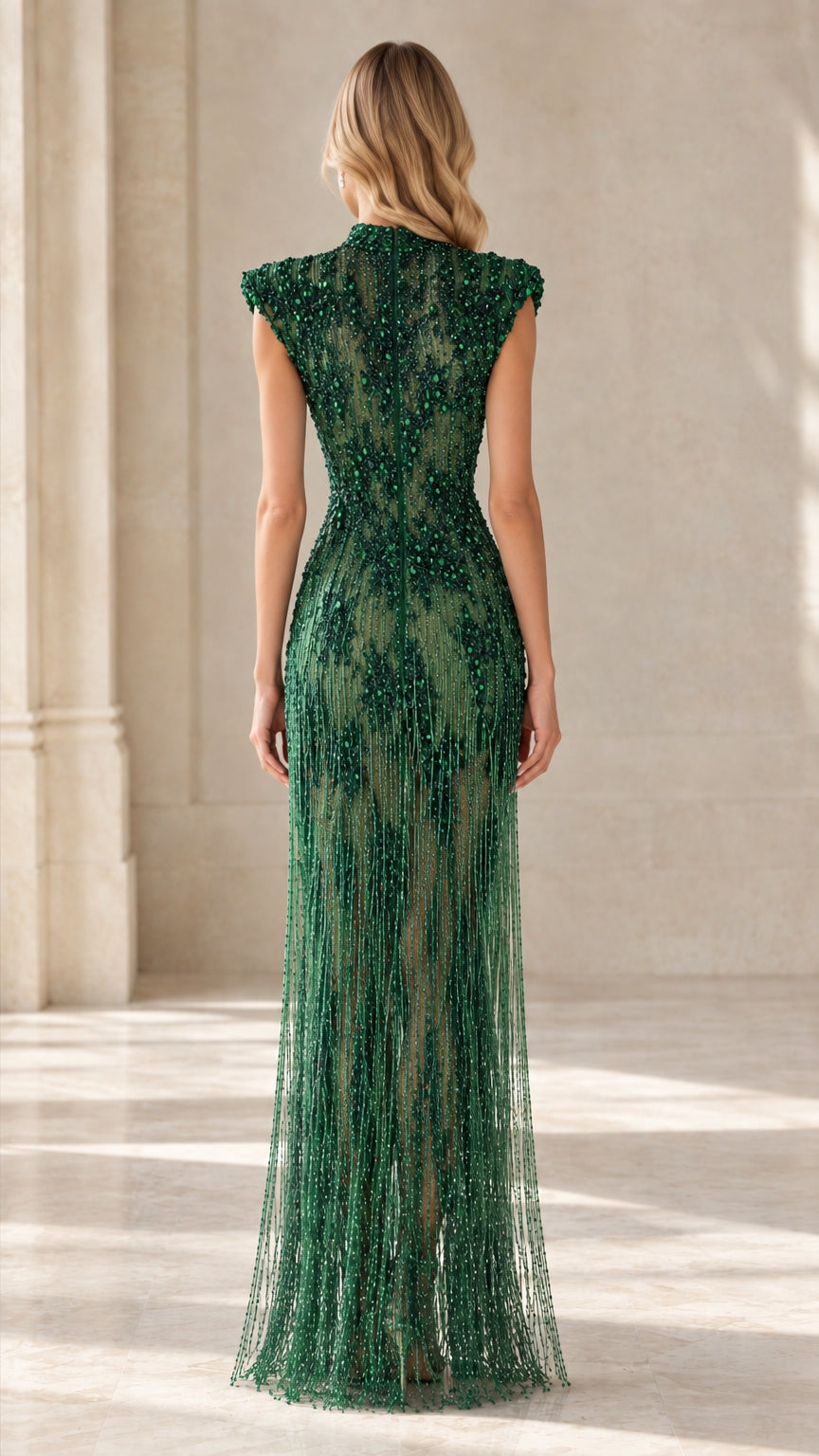 Back view of Emerald Green high-neck beaded evening gown with cascading fringe