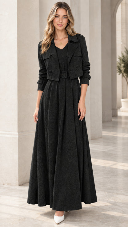 Full front view of model wearing Black cropped jacket and pleated maxi dress set