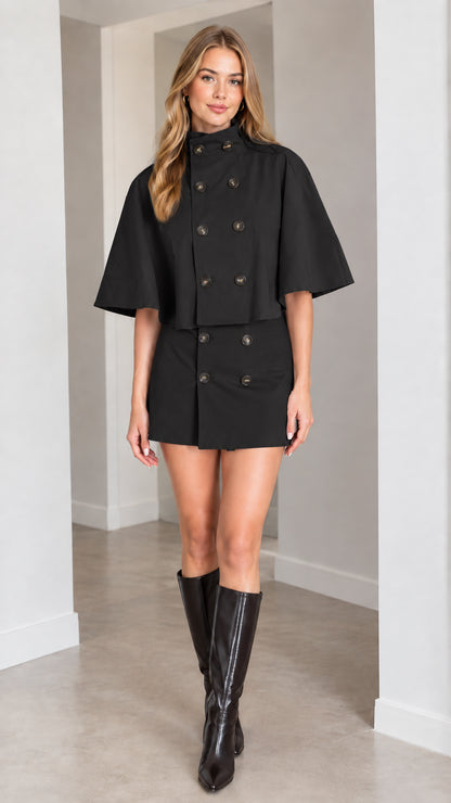 Model wearing black double-breasted capelet and mini skirt two-piece set