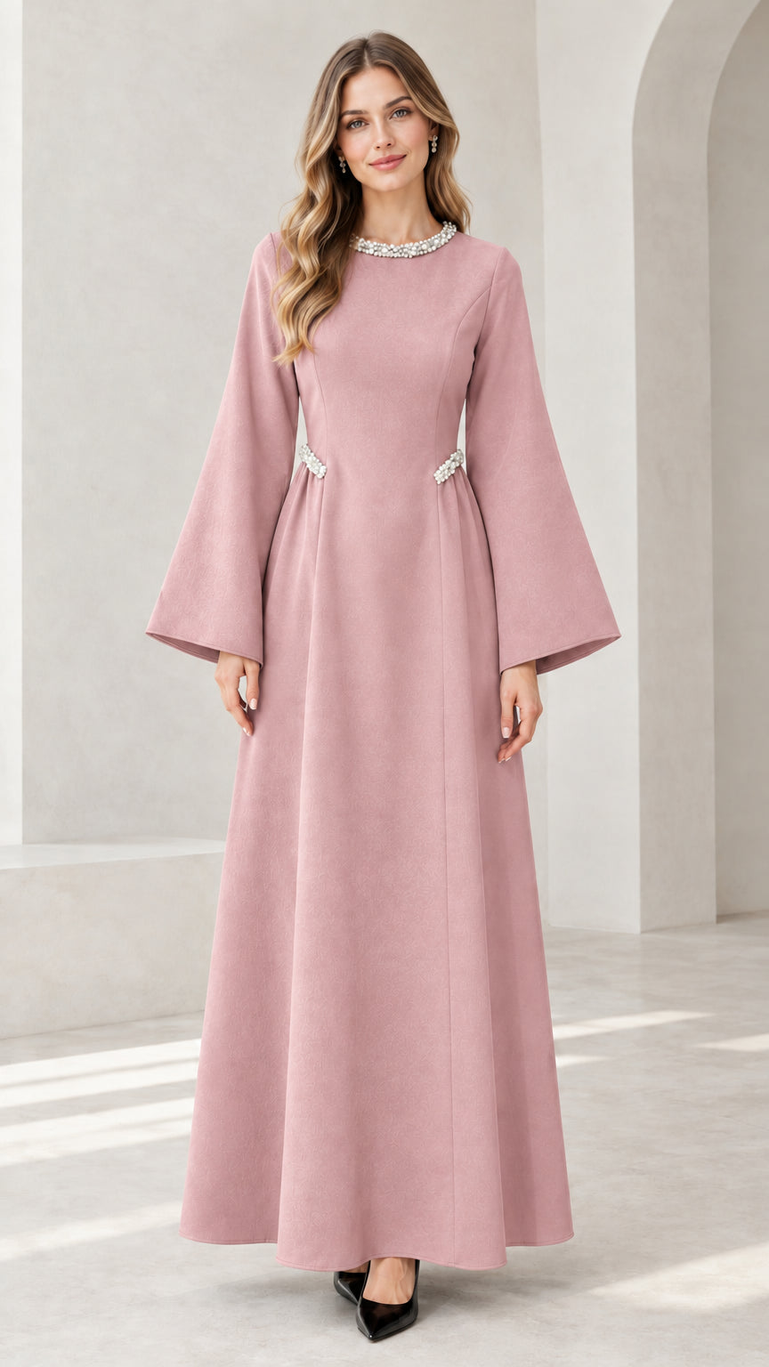 Front view of model wearing dusty pink embellished flare sleeve maxi dress