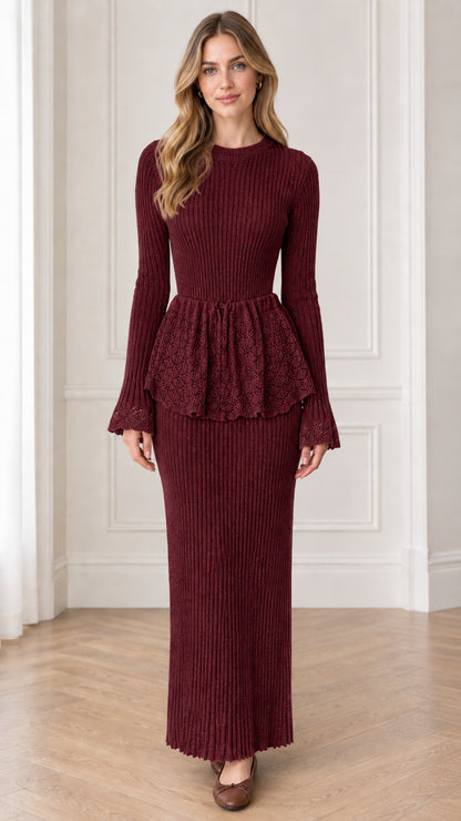 Front view of burgundy ribbed knit peplum maxi dress with lace trim