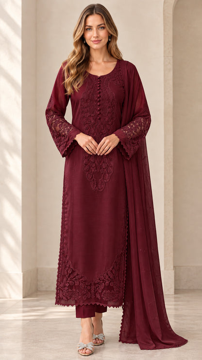 Model wearing deep burgundy embroidered kurta and pant set with dupatta