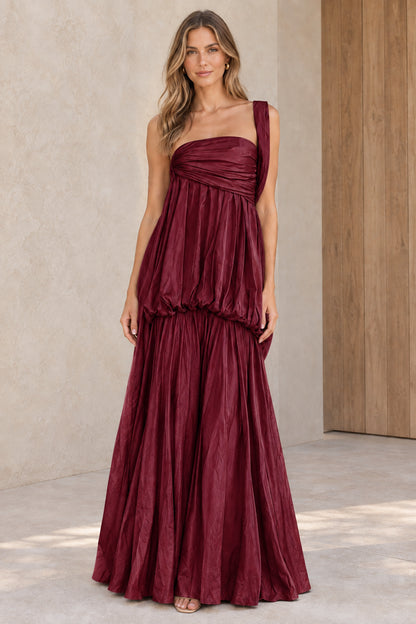 Front view of burgundy wine one-shoulder pleated maxi evening dress