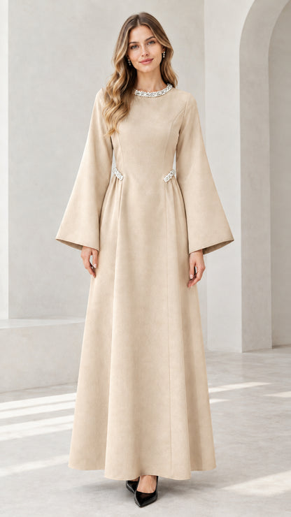 Front view of model wearing beige embellished flare sleeve maxi dress