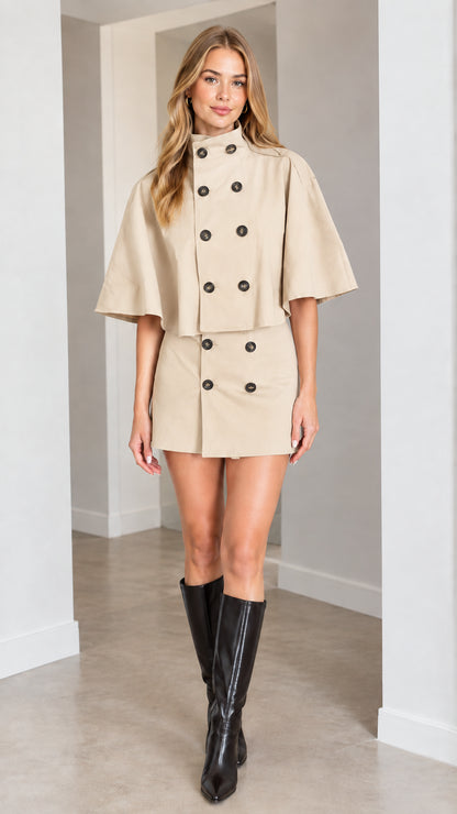 Full-length studio shot of model in beige double-breasted cape skirt set