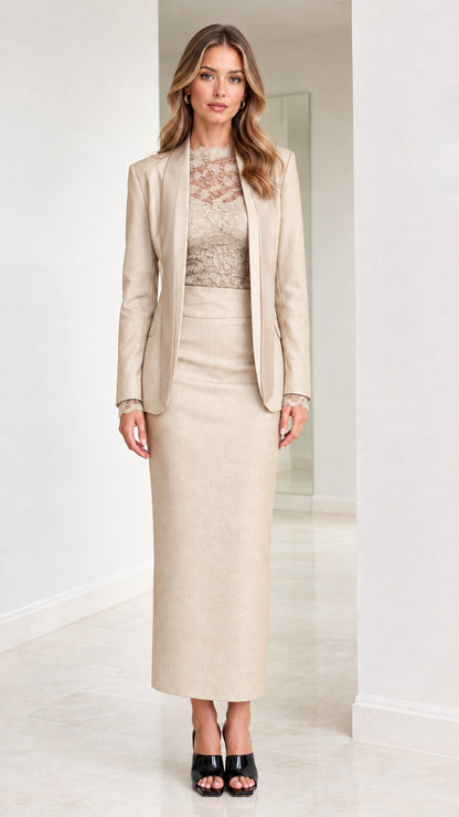Front view of champagne beige tailored blazer and maxi skirt suit set with lace top